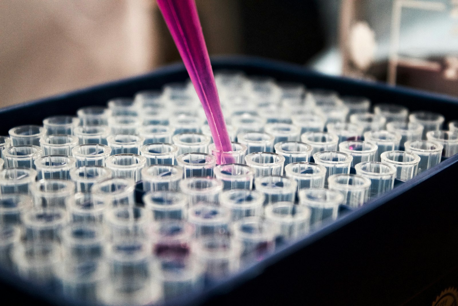Analytical chemistry laboratory with HPLC instruments and scientists